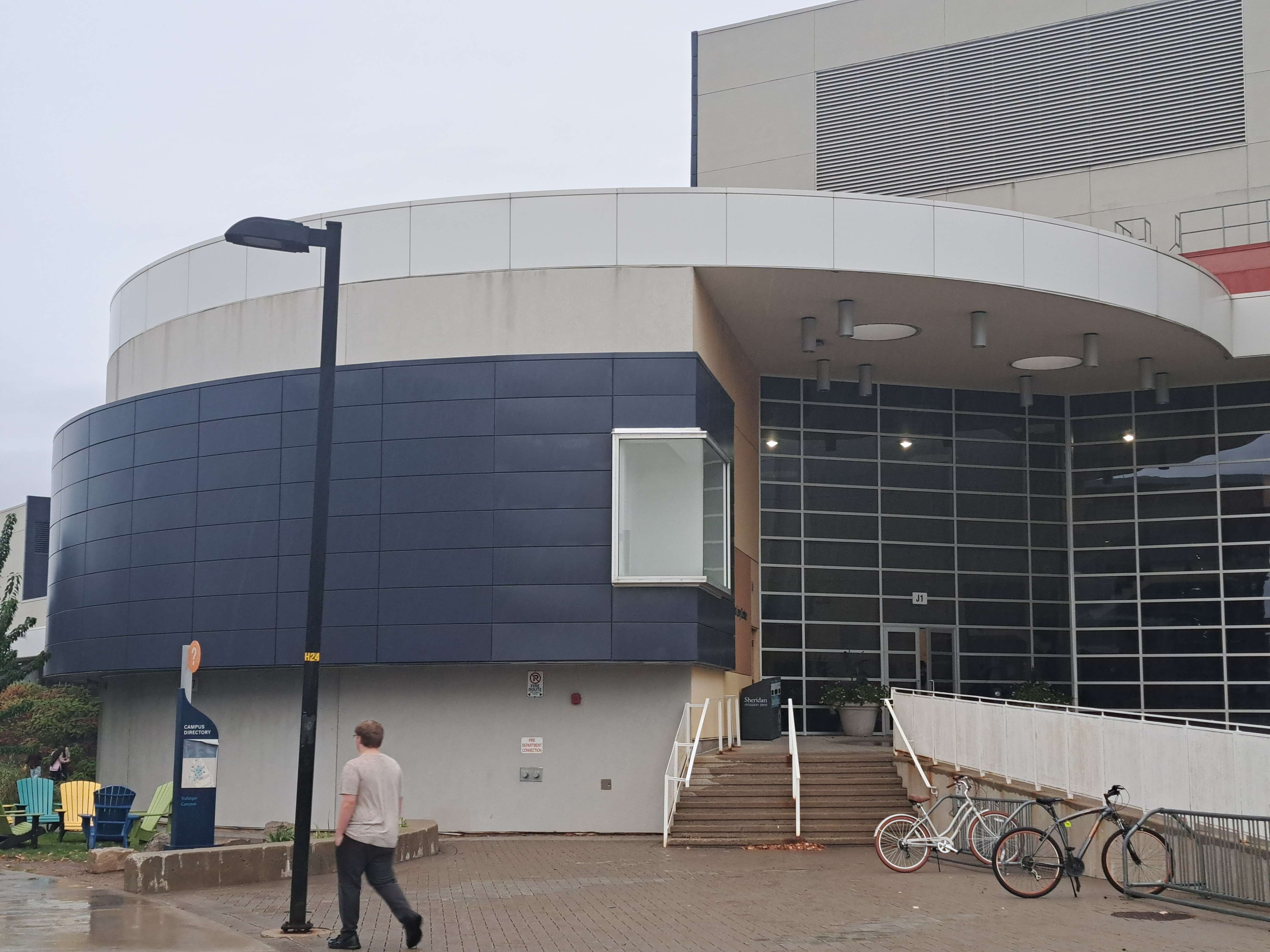 J wing Entrance<br>Primary entrance for J wing or H wing<br>Uncommon to have round buildings, gives unique silhouette<br>Has lots of glass so there's plenty of natural light